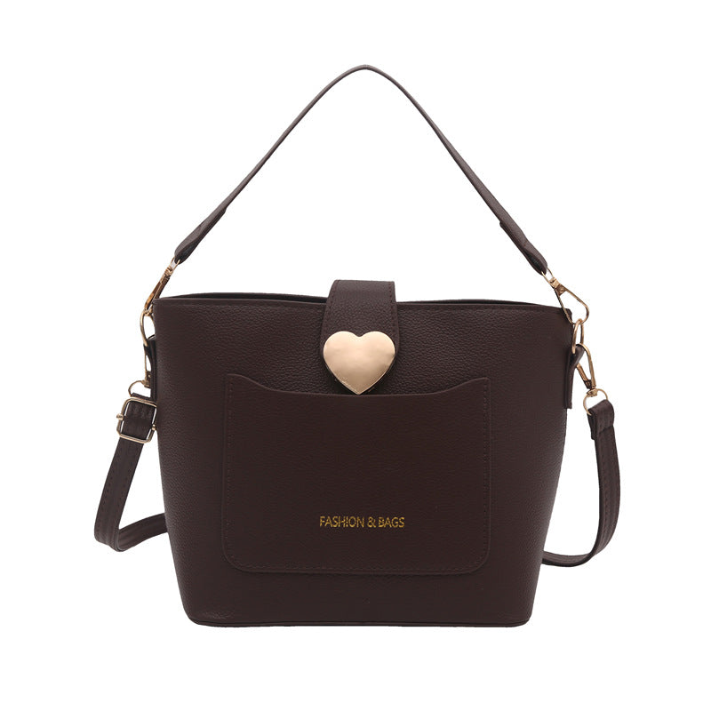 Damen Schultertasche mit herzförmigem Verschluss Nord Taschen