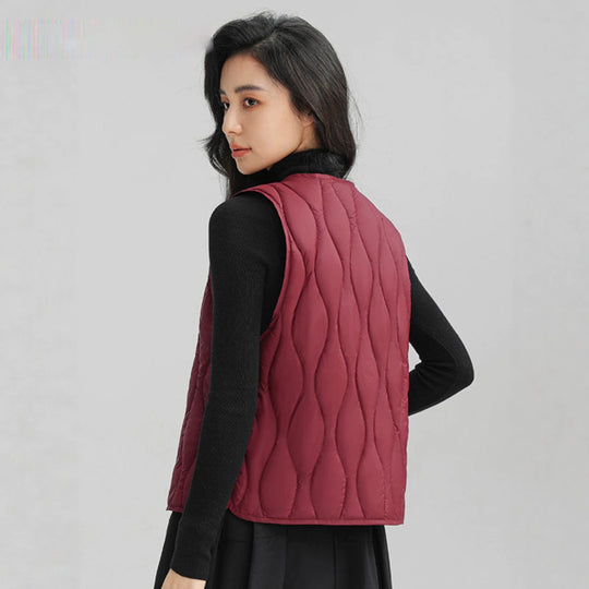 Damen Lange gesteppte Thermoweste mit ergonomischer Wellensteppung Nord Taschen