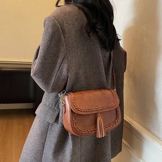 Damentasche mit geflochtenen Details und tierischem Akzent Nord Taschen