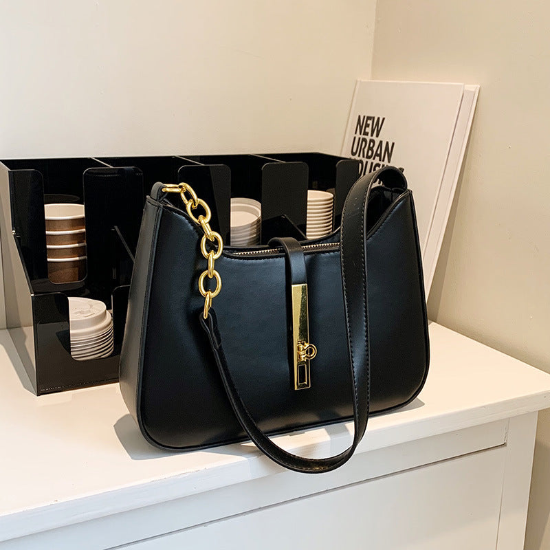 Damen Schultertasche mit elegantem Kettenverschluss und modernem Design Nord Taschen