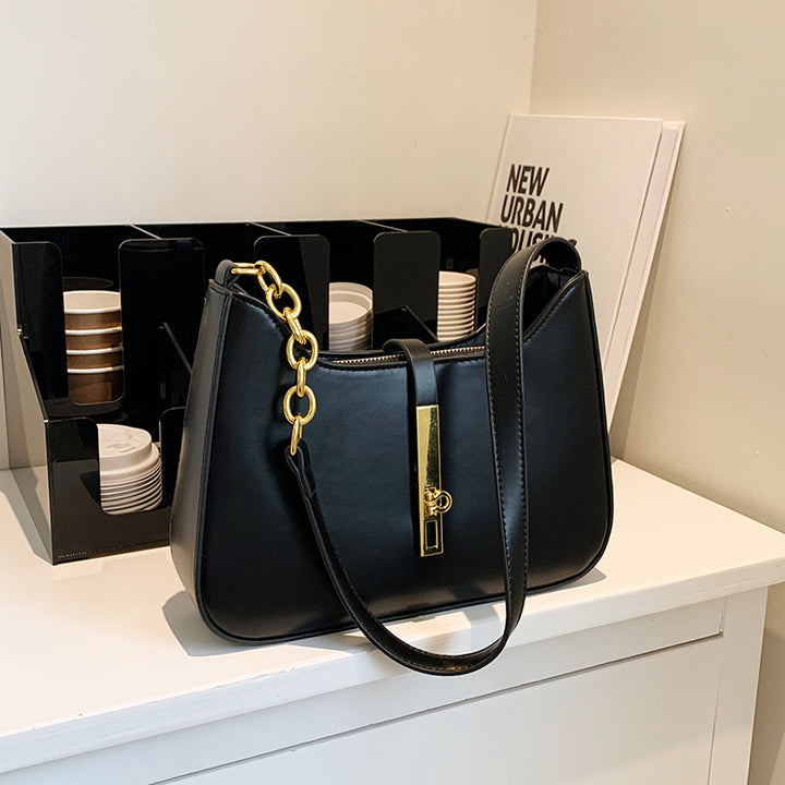 Damen Schultertasche mit elegantem Kettenverschluss und modernem Design Nord Taschen