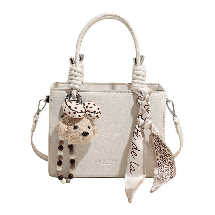 Damen Handtasche mit integriertem Tragegurt und geflochtenen Details Nord Taschen