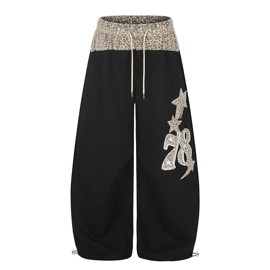 Damen Extraweite Palazzo-Loungehose mit hohem Komfortbund, Leoprint-Bund und dekorativer Stern-Ziffer-Applikation Nord Taschen