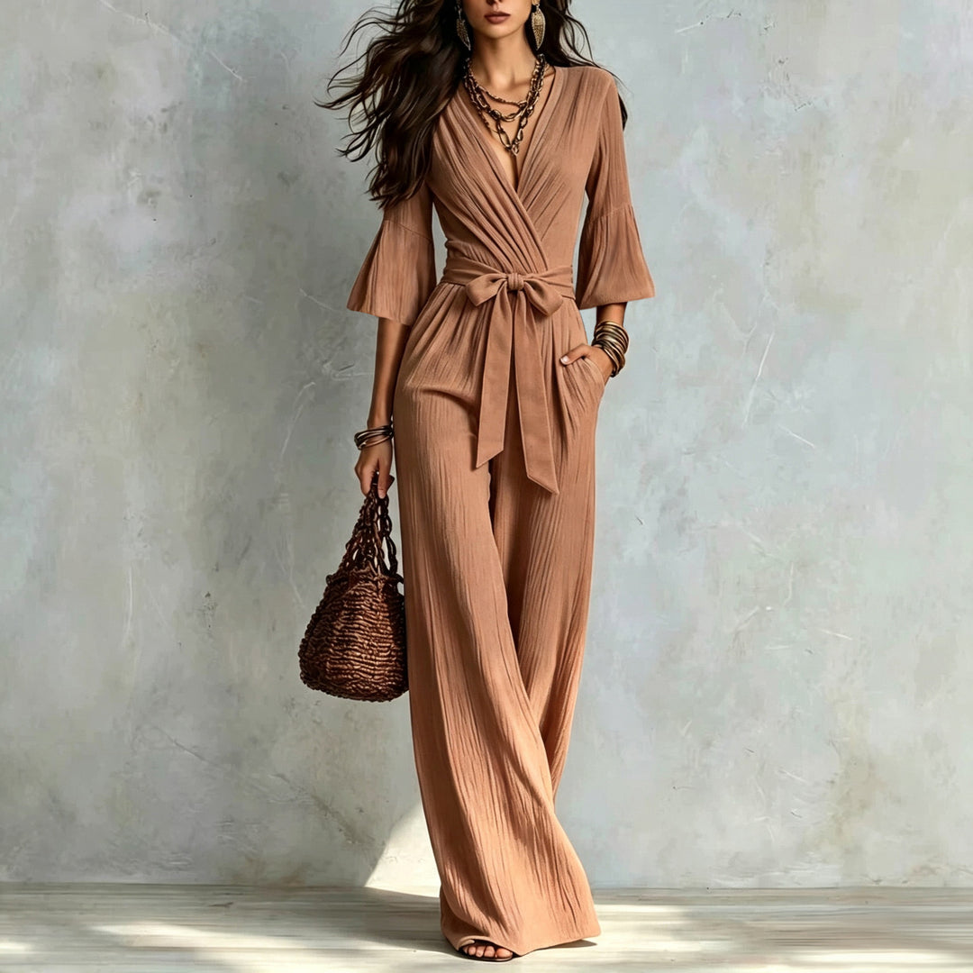 Damen Jumpsuit Wickel-Optik mit weitem Bein, Taillengürtel und Glockenärmeln Nord Taschen