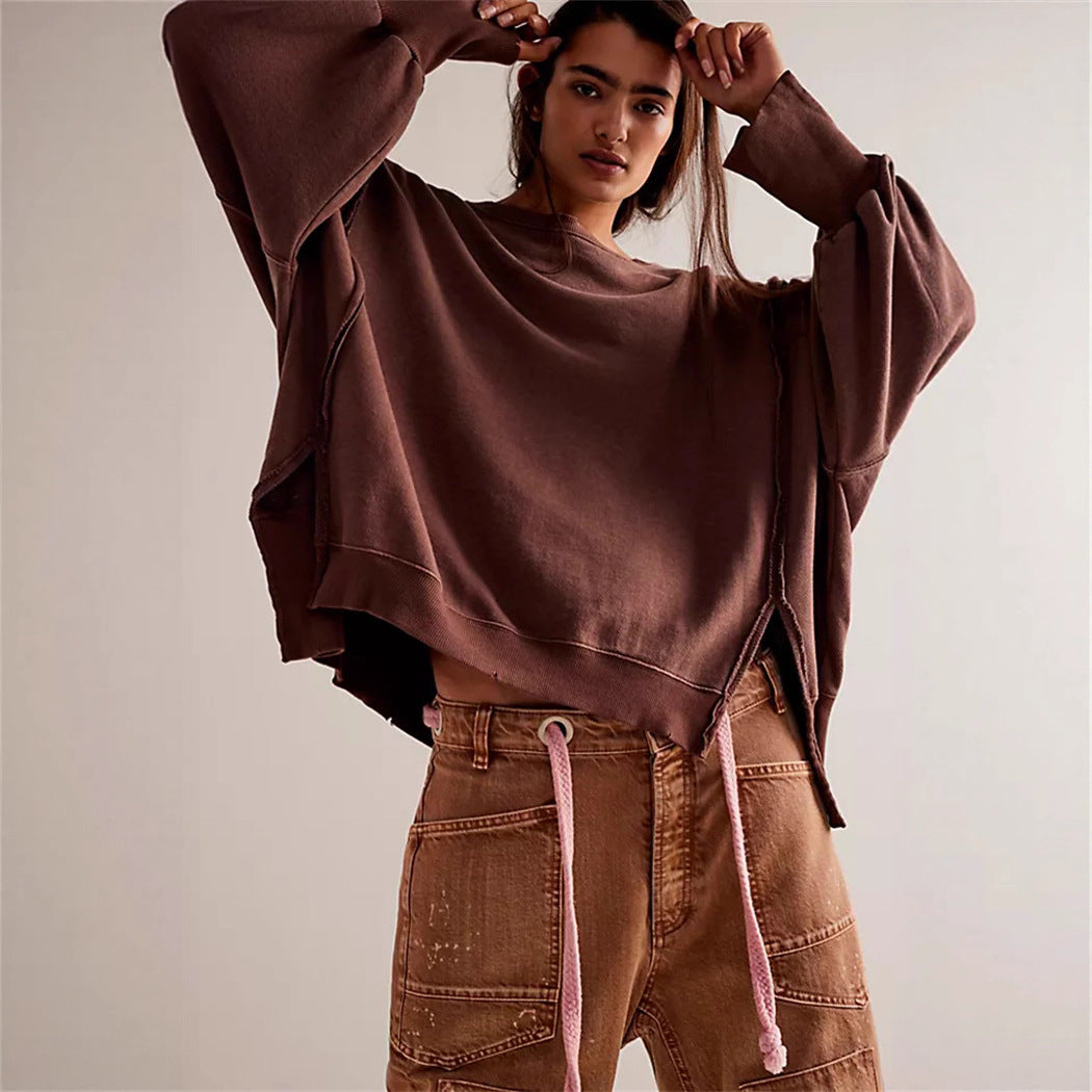 Damen oversized Sweatshirt mit Ballonärmeln, offenen Saumnähten und seitlichen Schlitzen Vittorelli