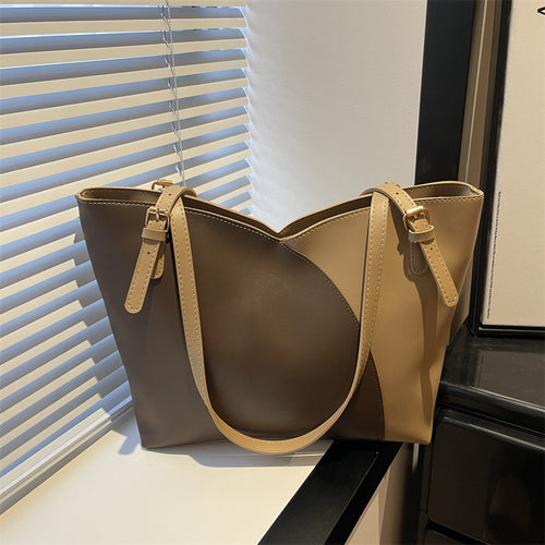 Damen elegante Handtasche mit asymmetrischem Design und robusten Trageriemen Nord Taschen