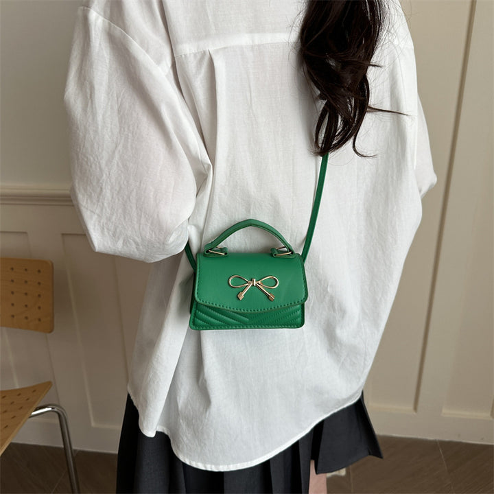 Damen Mini-Handtasche mit eleganter Schleifenverzierung Nord Taschen