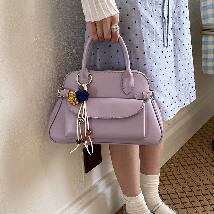 Damen Handtasche mit elegantem Faltendesign und bunten Anhängern Nord Taschen