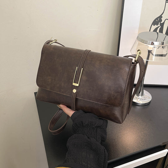 Damen elegante Umhängetasche aus hochwertigem Kunstleder mit zuverlässigem Klappverschluss Nord Taschen