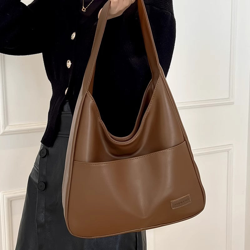 Damen Hobo-Tasche aus glattem Kunstleder mit praktischen Außentaschen Nord Taschen