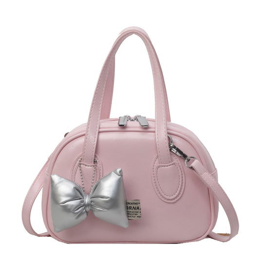 Damen Designer-Handtasche im verspielten Stil mit dekorativem Schleifen-Detail | Nord Taschen