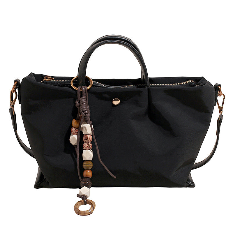 Damen elegante Umhängetasche mit charmantem Dekor Nord Taschen