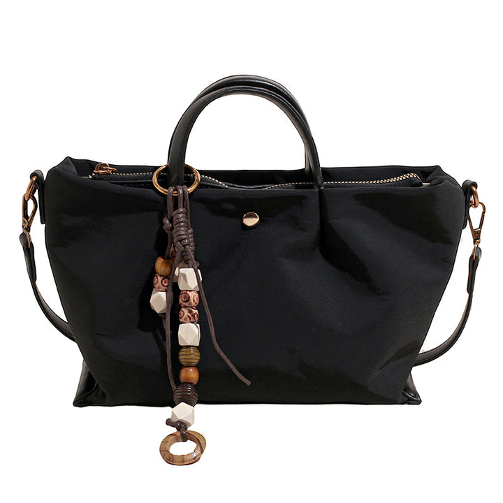 Damen elegante Umhängetasche mit charmantem Dekor Nord Taschen