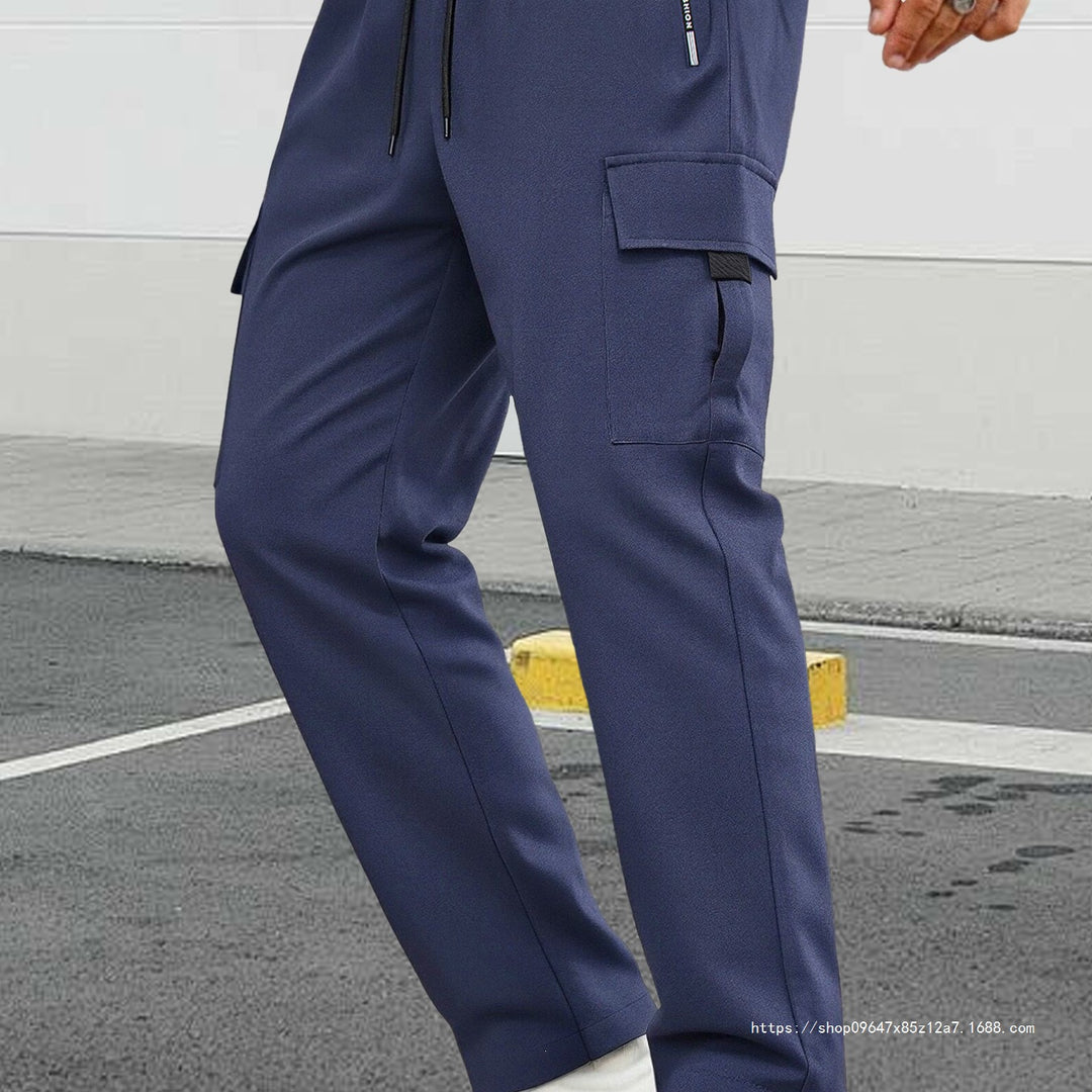 Herren Tapered-Cargo-Jogginghose mit verdecktem Tunnelzug, Zip‑Tasche & Utility‑Klappe Nord Taschen