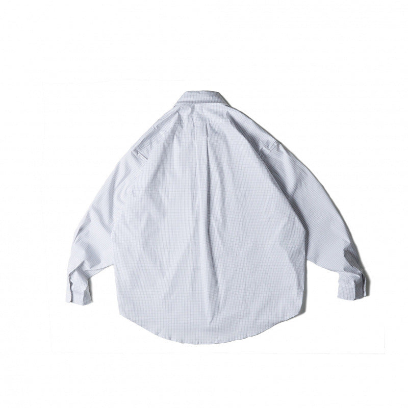 Unisex Oversize-kariertes Hemd mit rundem Saum und aufgesetzten Brusttaschen Nord Taschen