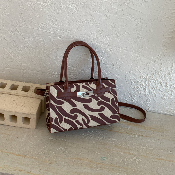 Damen Designer Handtasche mit verspieltem Kettenmuster Nord Taschen