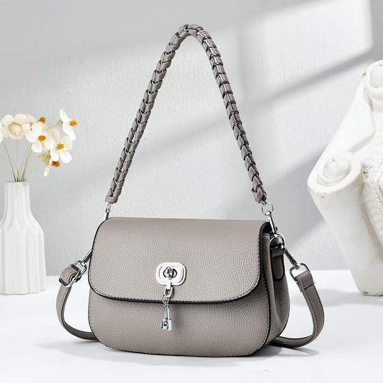 Damen elegante Umhängetasche mit strukturierter Oberfläche und geflochtenem Schulterriemen Nord Taschen