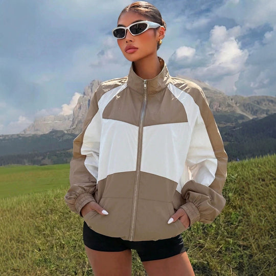 Damen Leichte Windbreaker‑Jacke mit hohem Stehkragen und Colorblock‑Design Nord Taschen