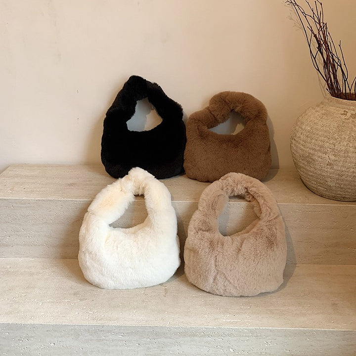 Damen Handtasche aus luxuriösem Kunstfell Nord Taschen