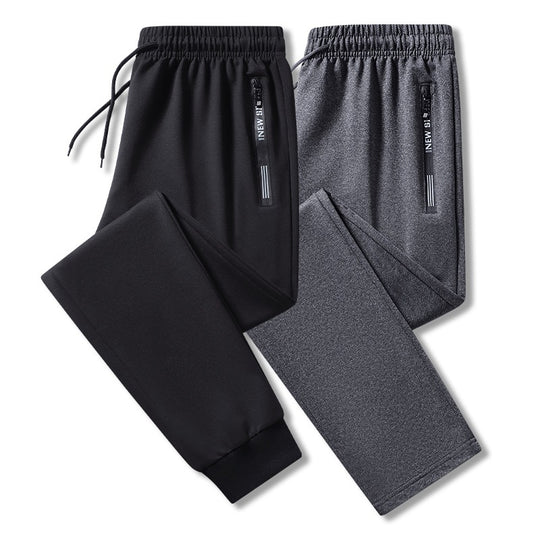 Herren Sportliche Trainingshose mit elastischem Tunnelzugbund, Reißverschlusstasche und glattem Performance‑Material Nord Taschen