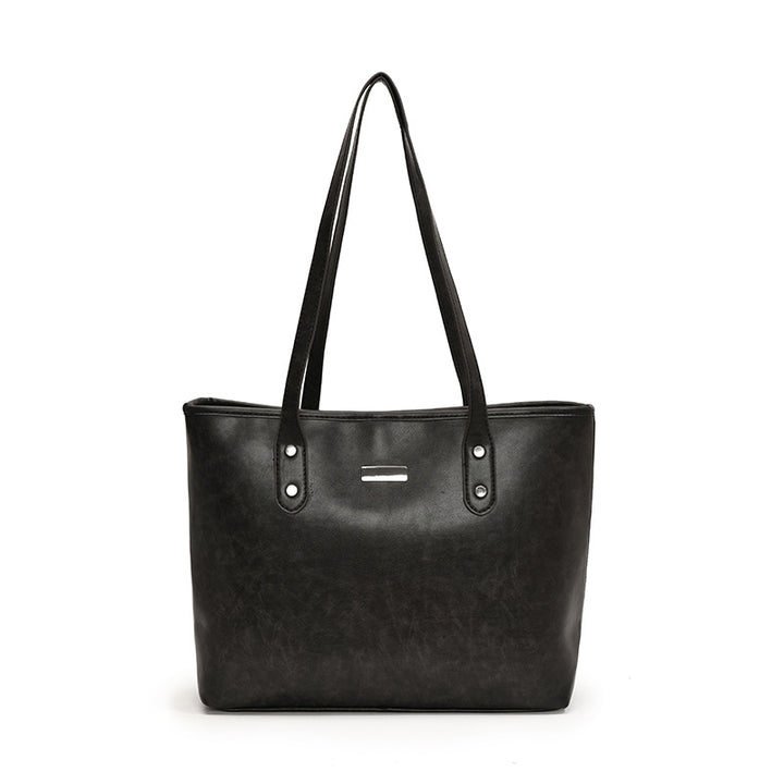 Damen elegante Tragetasche mit hochwertigen Kunstlederdetails Nord Taschen