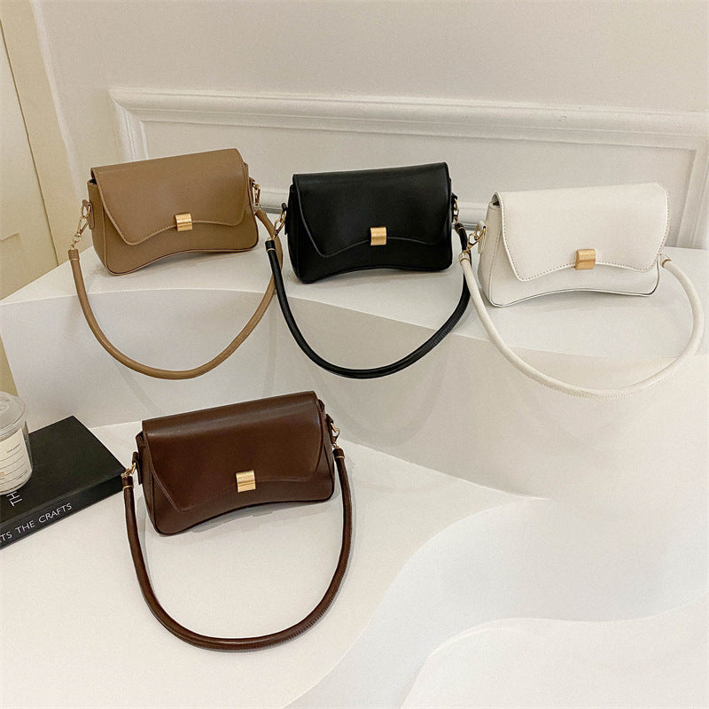 Damen elegante Umhängetasche mit goldener Verschlussmechanik Nord Taschen