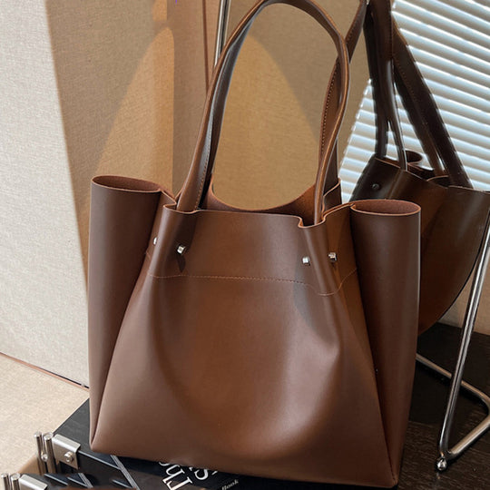 Damen elegante Tragetasche mit feinem Kunstleder und goldenen Akzenten Nord Taschen
