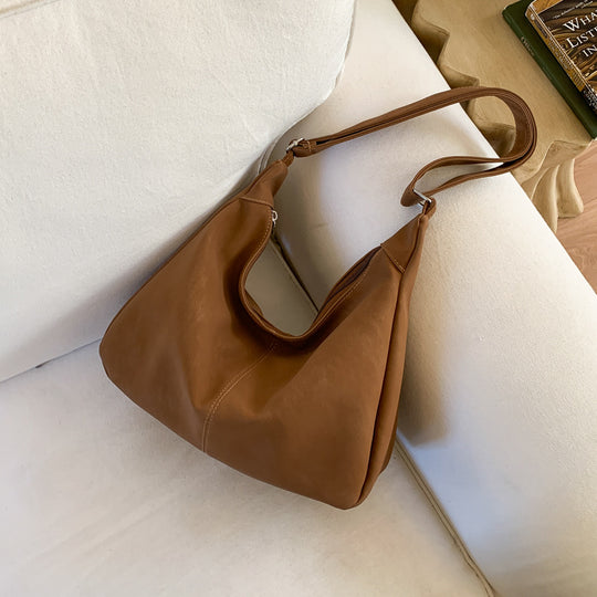 Damen Hobo-Tasche aus hochwertigem Leder mit luftigem Design Nord Taschen
