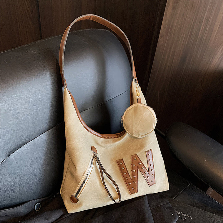 Damen Handtasche mit dekorativem Anhänger und praktischen Fächern Nord Taschen