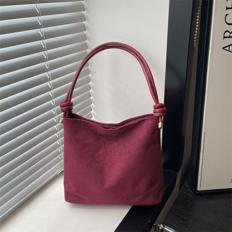 Damen elegante Wildleder-Handtasche mit modischen Akzenten Nord Taschen