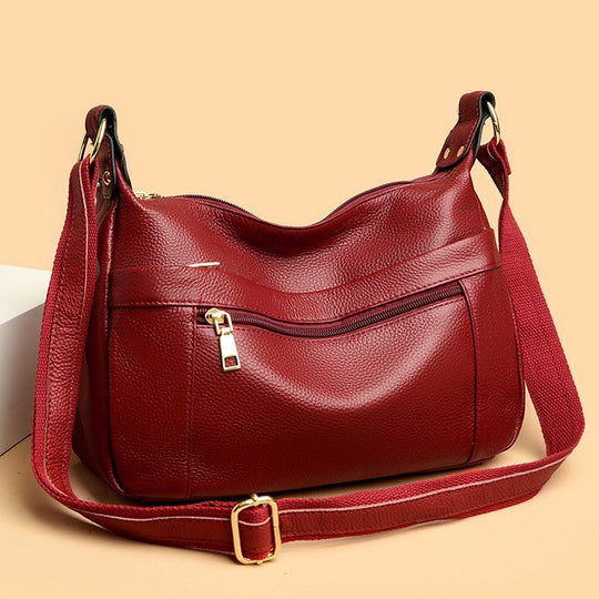 Nord Taschen | Leder-Umhängetasche für Damen - Hochwertige Schultertasche mit praktischen Reißverschlusstaschen