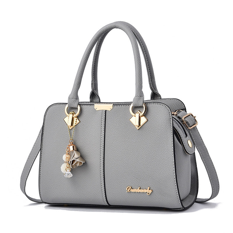 Damen elegante Handtasche mit charmanten Anhängern Nord Taschen