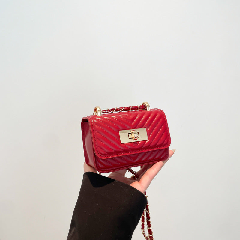 Damen Mini-Handtasche mit gestepptem Design und goldenem Verschluss Nord Taschen
