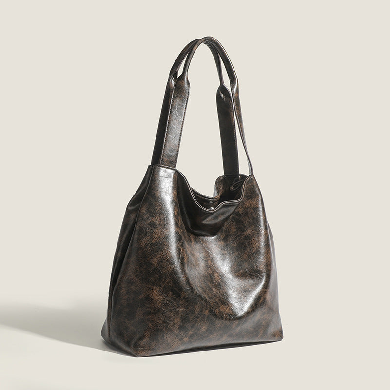 Damen Hobo-Tasche aus hochwertigem Kunstleder mit elegantem, geschwungenem Design Nord Taschen