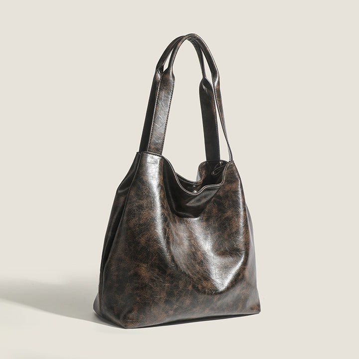 Damen Hobo-Tasche aus hochwertigem Kunstleder mit elegantem, geschwungenem Design Nord Taschen