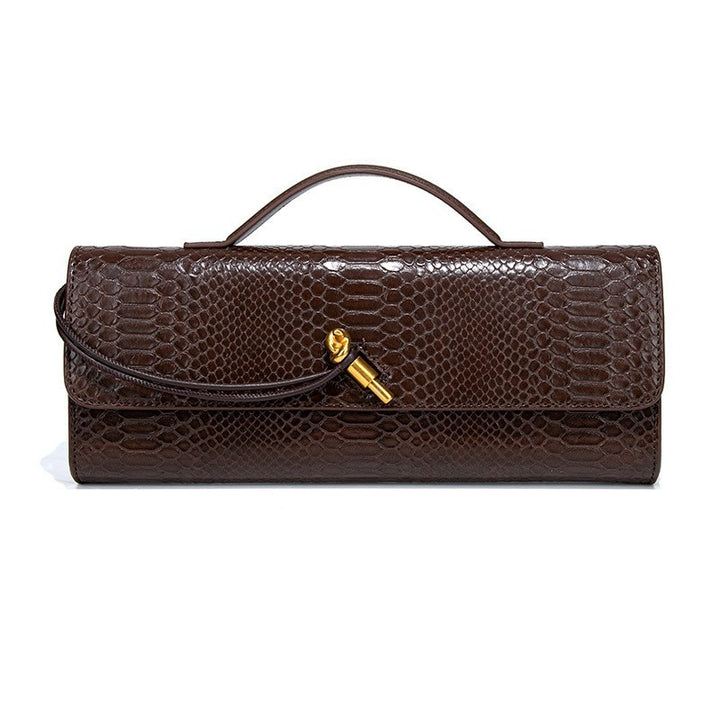 Damen Clutch mit schimmerndem Schlangenhautmuster Nord Taschen