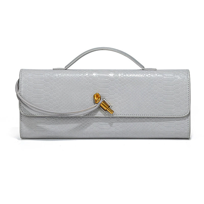 Damen Clutch mit schimmerndem Schlangenhautmuster Nord Taschen