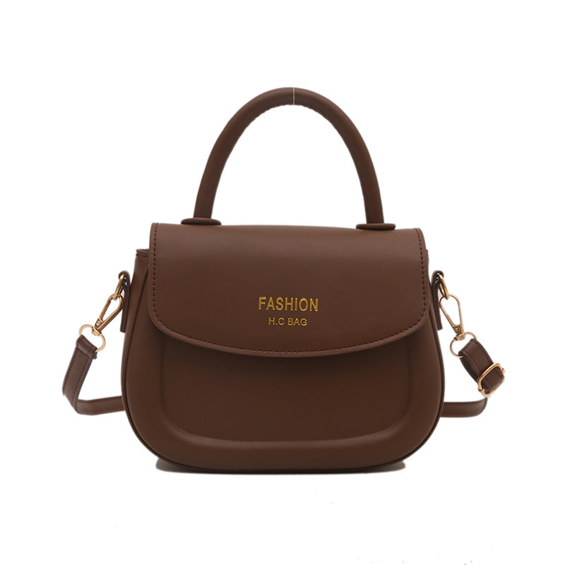 Damen Henkeltasche mit modernem Klappverschluss und eleganten Details Nord Taschen