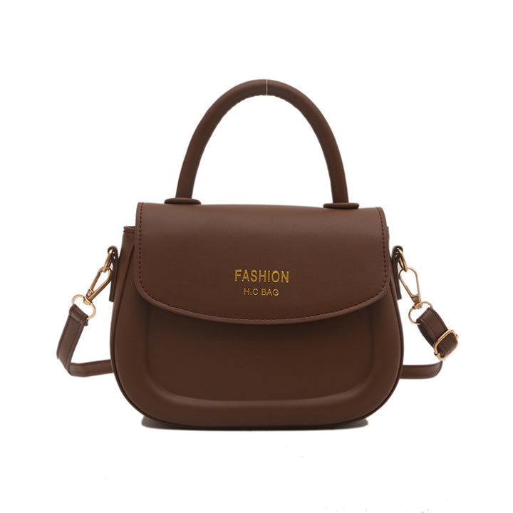 Damen Henkeltasche mit modernem Klappverschluss und eleganten Details Nord Taschen