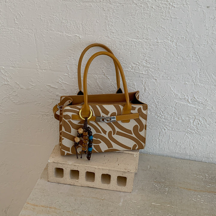 Damen Designer Handtasche mit verspieltem Kettenmuster Nord Taschen
