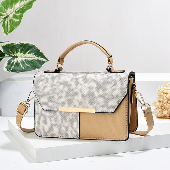 Damen modische Umhängetasche mit strukturiertem Design und goldenen Akzenten Nord Taschen