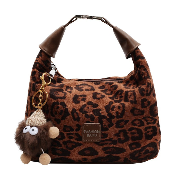 Damenhandtasche aus fellartigem Material mit Leopardenmuster Nord Taschen