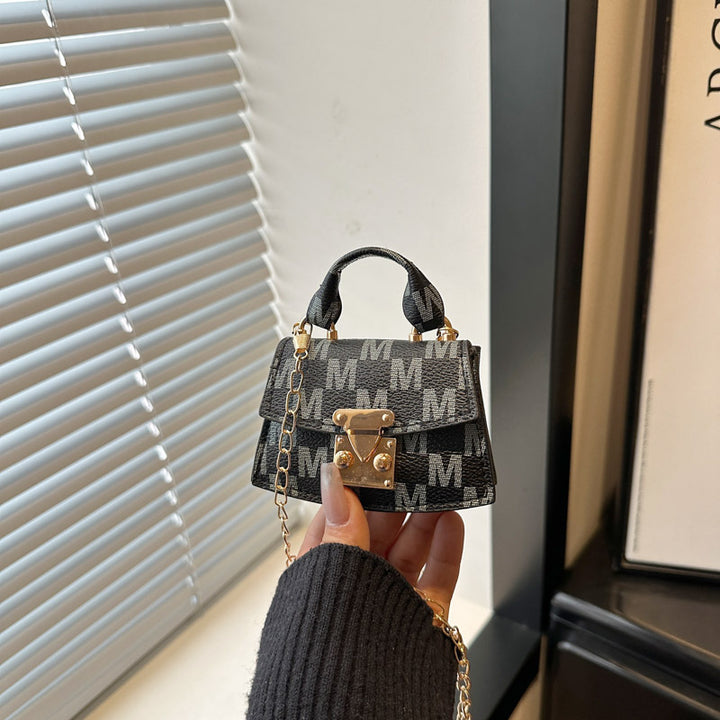 Damen Mini-Handtasche mit dekorativem Kettenriemen Nord Taschen