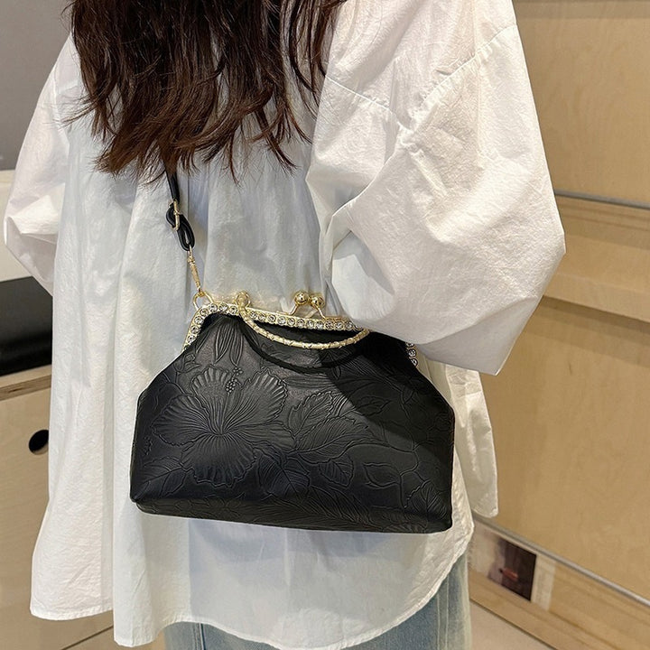 Damen elegante Handtasche mit floralem Relief und goldenen Akzenten Nord Taschen