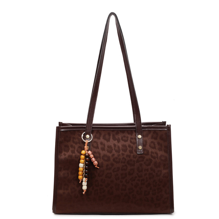 Damen Umhängetasche mit modernem Leopardenmuster und praktischen Details Nord Taschen