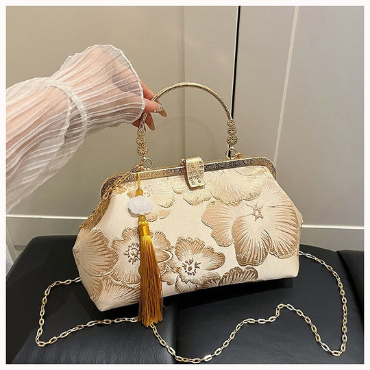 Damen elegante Clutch-Tasche mit floralem Druck und goldenen Akzenten Nord Taschen