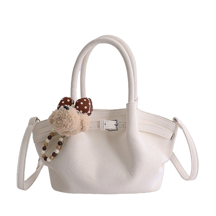 Damen elegante Handtasche mit verspieltem Tieranhänger Nord Taschen