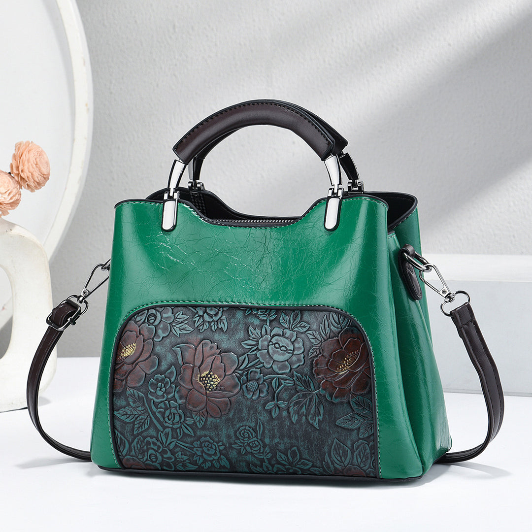 Damen elegante Handtasche mit floralem Relief Nord Taschen