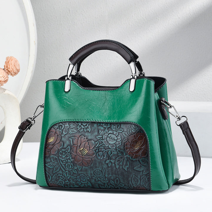 Damen elegante Handtasche mit floralem Relief Nord Taschen