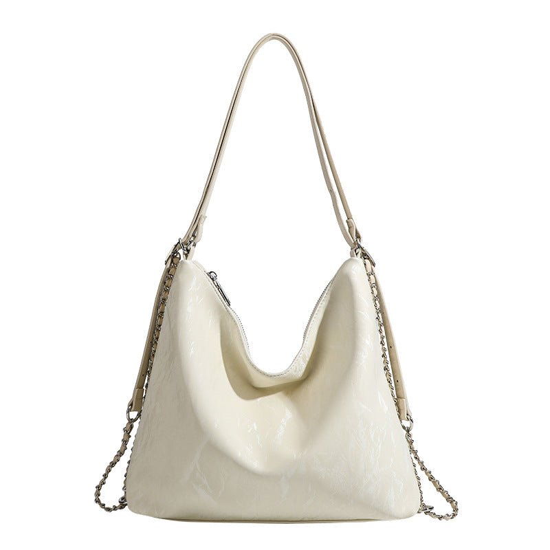 Damen Hobo-Tasche mit großzügigem Innenraum und eleganter Kettenapplikation Nord Taschen